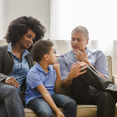 Parents having a serious discussion with their child